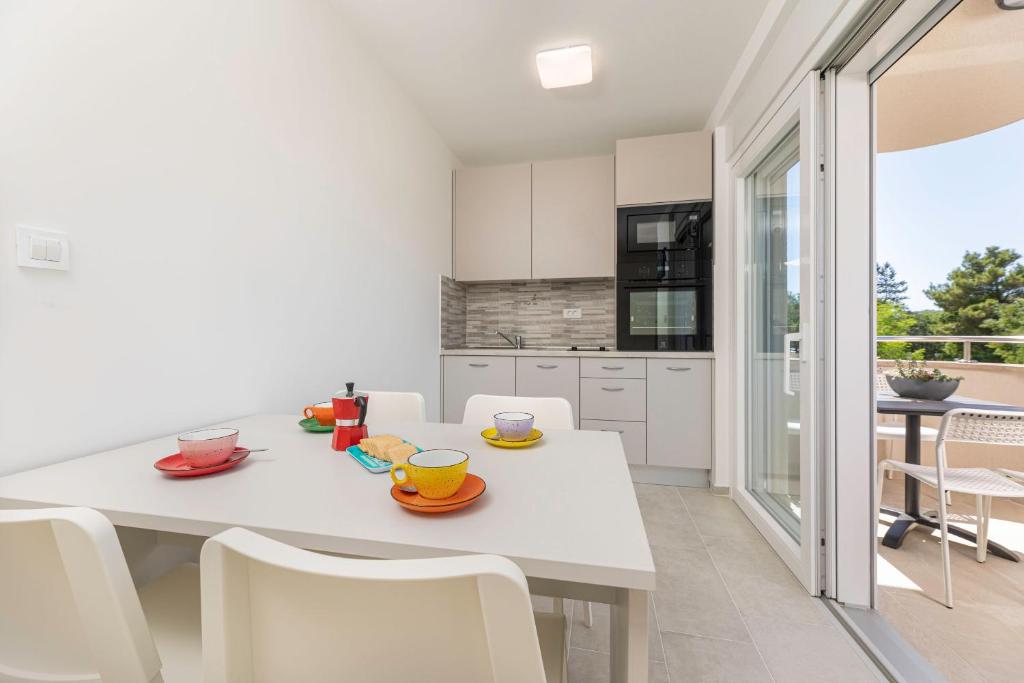 Кухня или мини-кухня в Apartments Sucic 2
