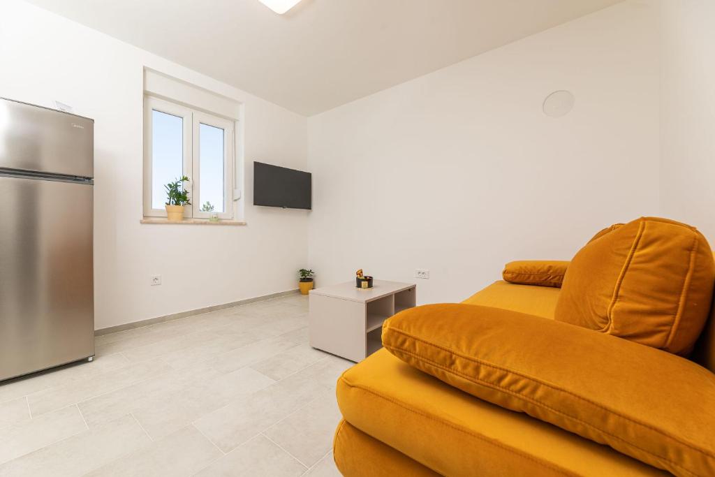 Телевизор и/или развлекательный центр в Apartments Sucic 2
