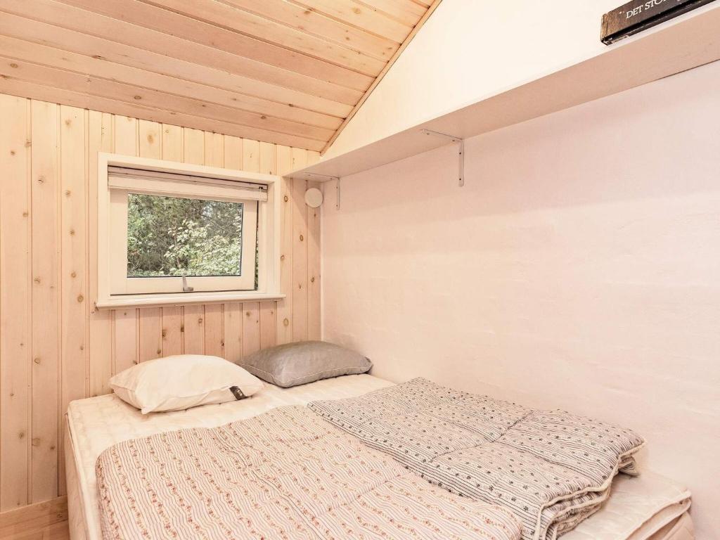 Postel nebo postele na pokoji v ubytování Holiday home Hals CXXVII