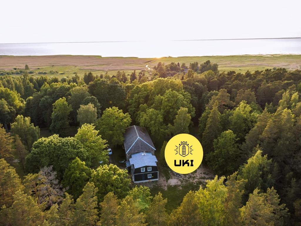an aerial view of a house in the middle of a forest at UKI Puhkeküla in Ranna