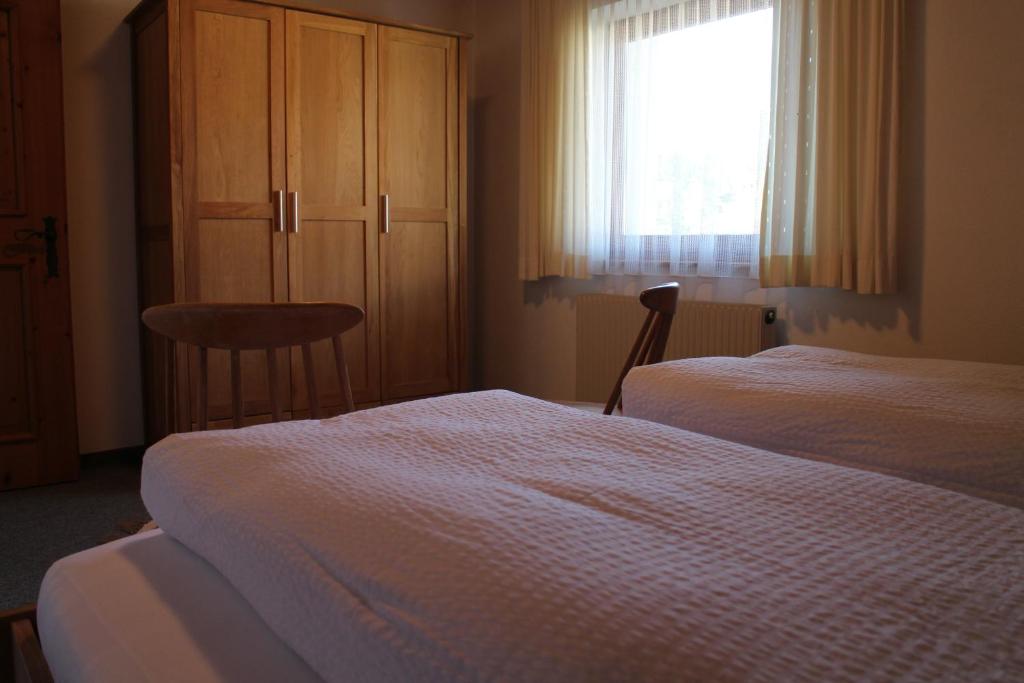 Postel nebo postele na pokoji v ubytování Haus Thaler
