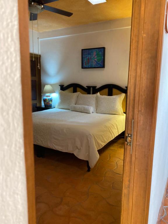 Postel nebo postele na pokoji v ubytování Hotel del Sol