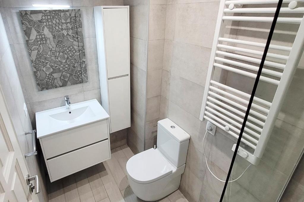 Koupelna v ubytování Precioso Apartamento a 3 minutos de la Playa, con parking gratuito