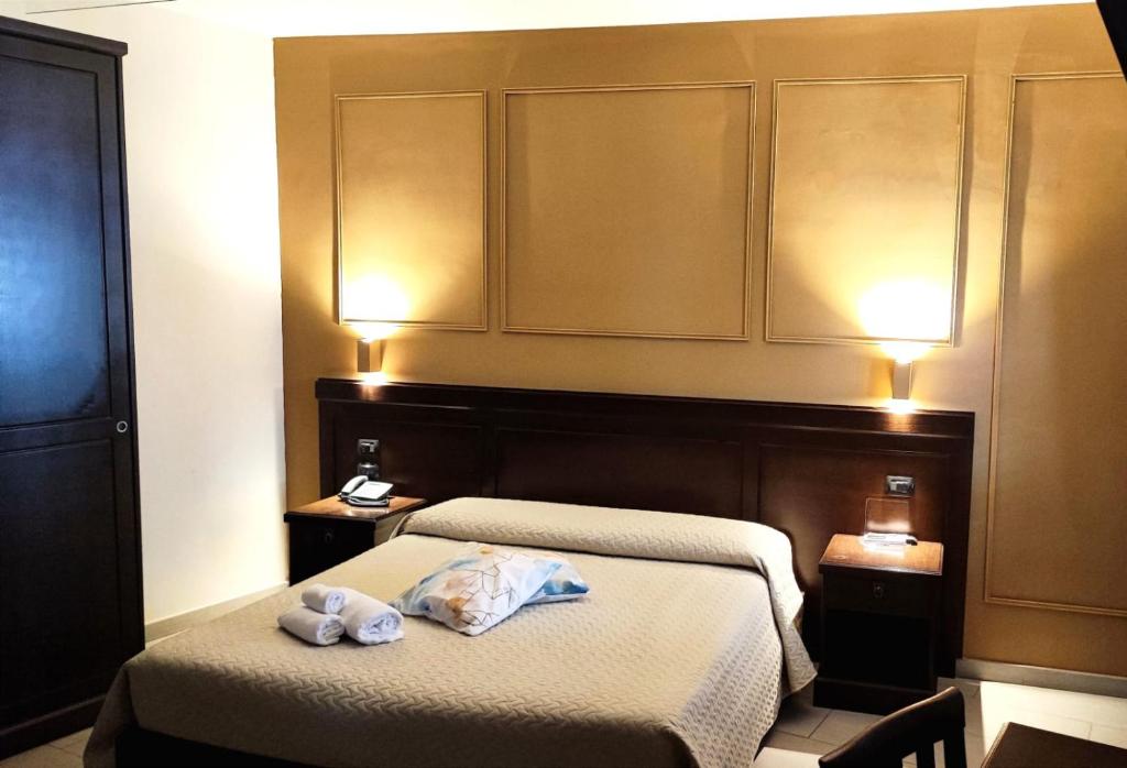 Postel nebo postele na pokoji v ubytování Albanuova Hotel