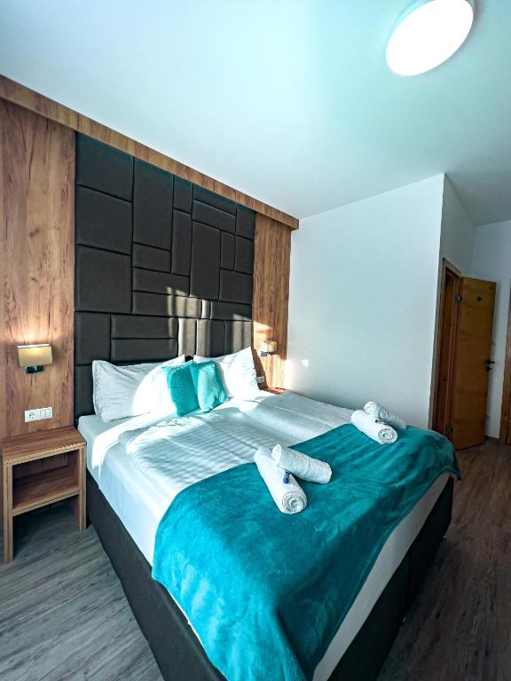 Postel nebo postele na pokoji v ubytování Sylpaulerhof Aparthotel