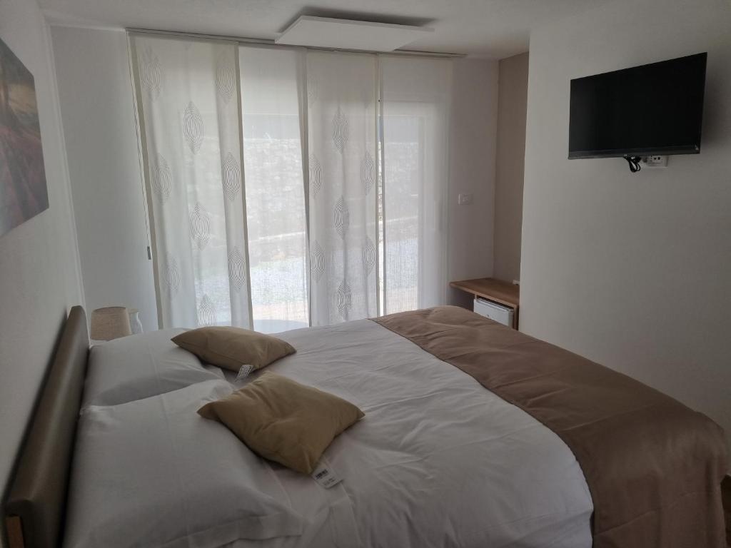 Postel nebo postele na pokoji v ubytování Shamarè Resort ****