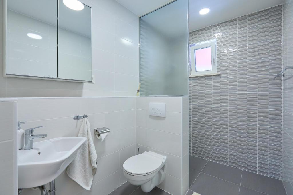 Kúpeľňa v ubytovaní Villa Larum