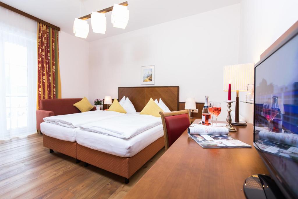 Postel nebo postele na pokoji v ubytování Hotel am See - Seeresidenz