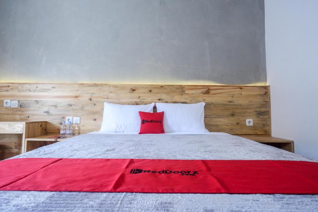 Postel nebo postele na pokoji v ubytování RedDoorz @ Klaten City