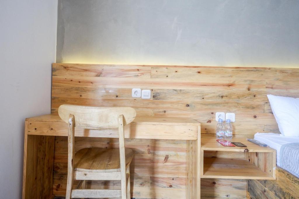 Postel nebo postele na pokoji v ubytování RedDoorz @ Klaten City