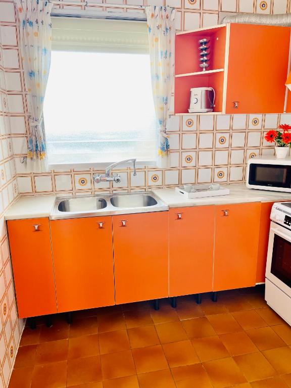 Kuchyňa alebo kuchynka v ubytovaní APARTBEACH BALANDRO CLIMATIZADO y VISTAS MAR