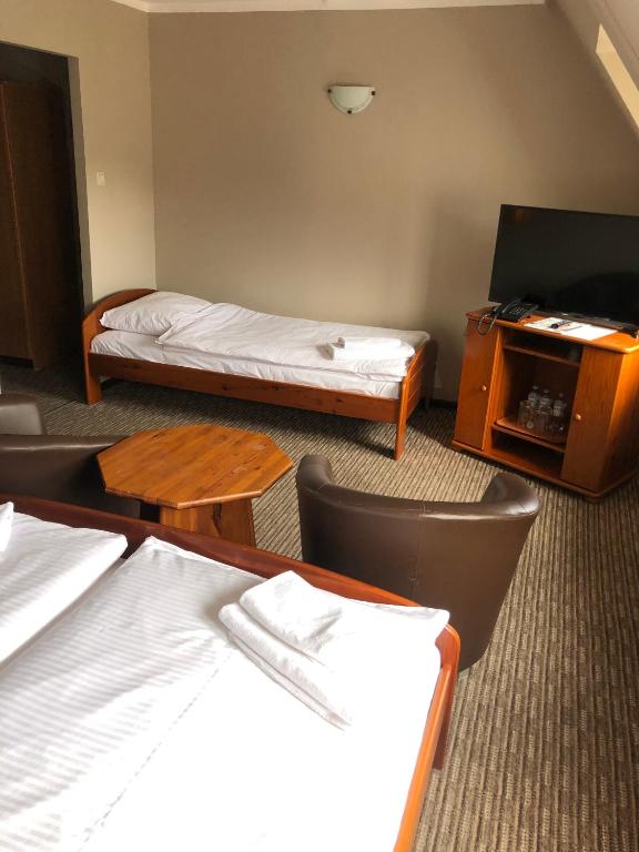 TV a/nebo společenská místnost v ubytování Hotel Krystyna