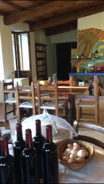Reštaurácia alebo iné gastronomické zariadenie v ubytovaní Il Casale del Popolo