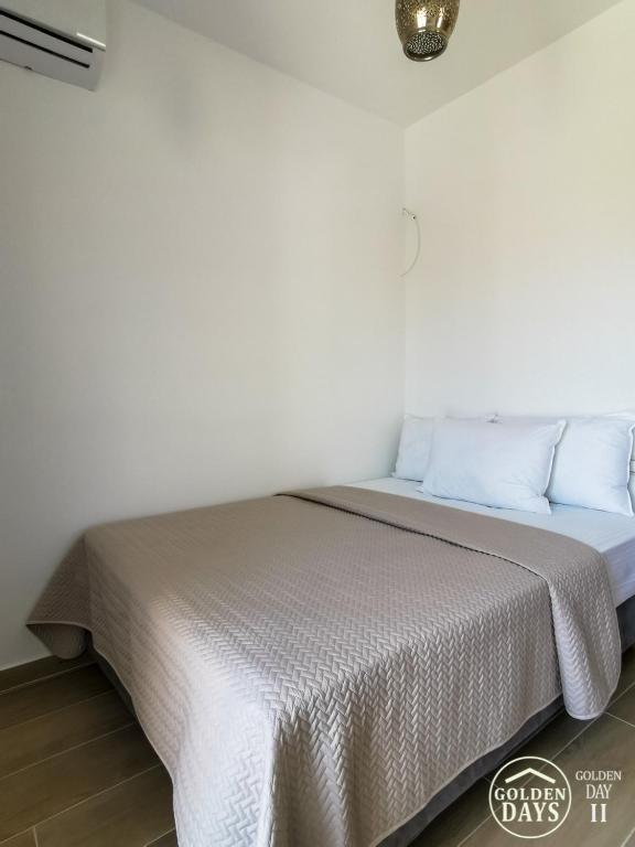 Postel nebo postele na pokoji v ubytování Golden Days villas