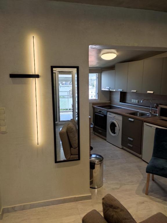 Kuchyňa alebo kuchynka v ubytovaní Sunny Luxury Penthouse