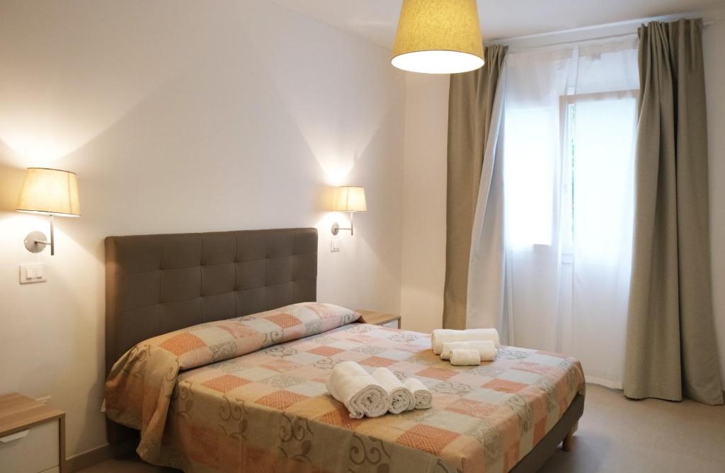 Posteľ alebo postele v izbe v ubytovaní Residence Chanel