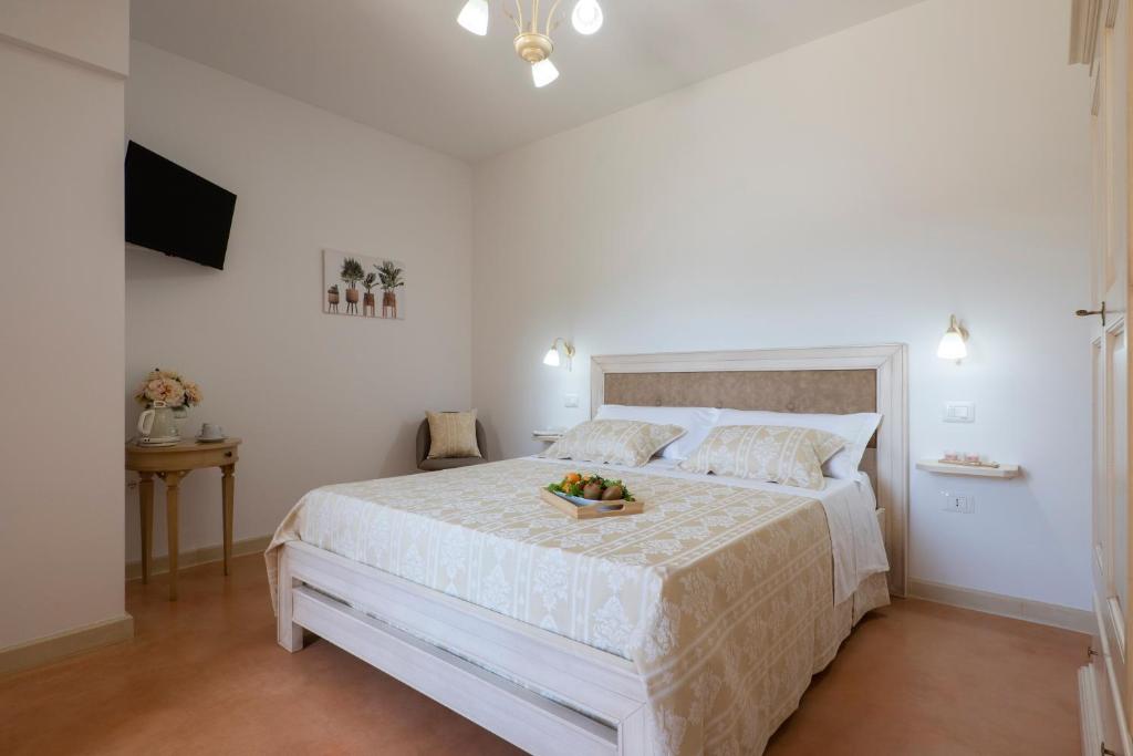 Łóżko lub łóżka w pokoju w obiekcie Arbor Exclusive B&B