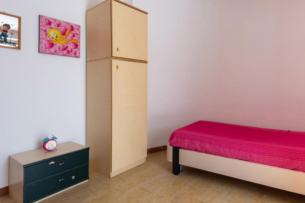 Posteľ alebo postele v izbe v ubytovaní Casa Viola - a 100 metri dal mare