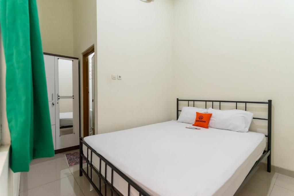 Posteľ alebo postele v izbe v ubytovaní KoolKost Syariah near LRT Boulevard Selatan Station - Minimum Stay 6 Nights