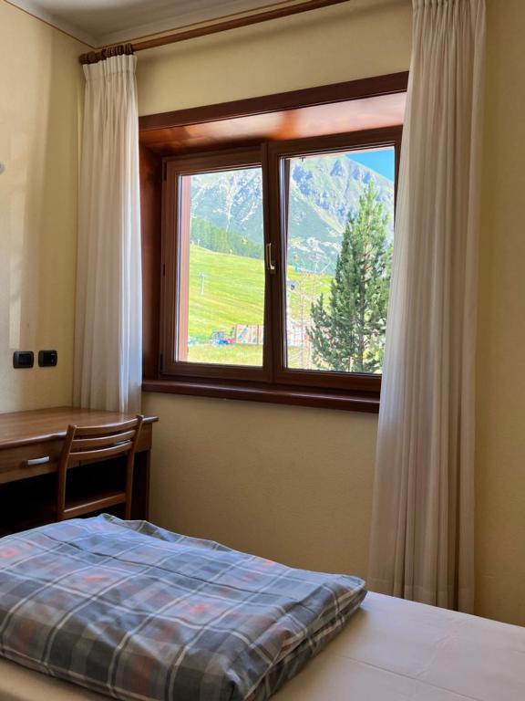Posteľ alebo postele v izbe v ubytovaní Casa Savio