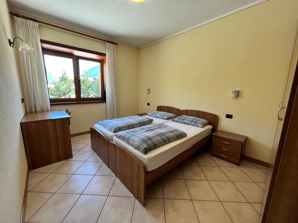Posteľ alebo postele v izbe v ubytovaní Casa Savio