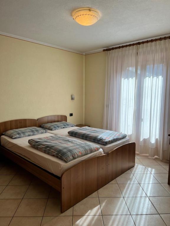 Posteľ alebo postele v izbe v ubytovaní Casa Savio
