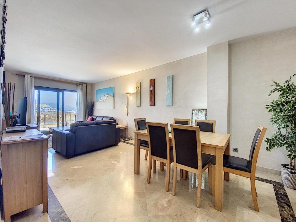 A seating area at Lovely apartment with pool & sea views - Marina Del Castillo 2129
