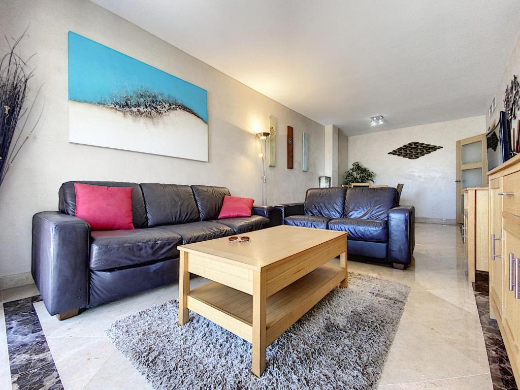 A seating area at Lovely apartment with pool & sea views - Marina Del Castillo 2129
