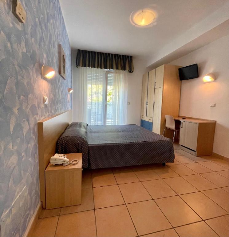 Postel nebo postele na pokoji v ubytování Hotel Souvenir - Koolibry Hotels