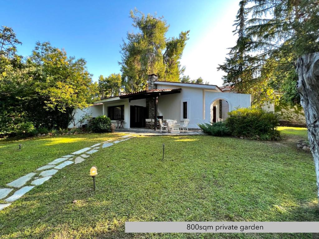 Zahrada ubytování Villa Niovi by halu! Sani Villas