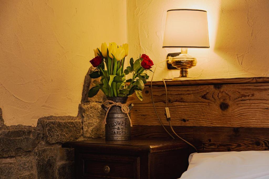 Postel nebo postele na pokoji v ubytování Hotel Jumeaux