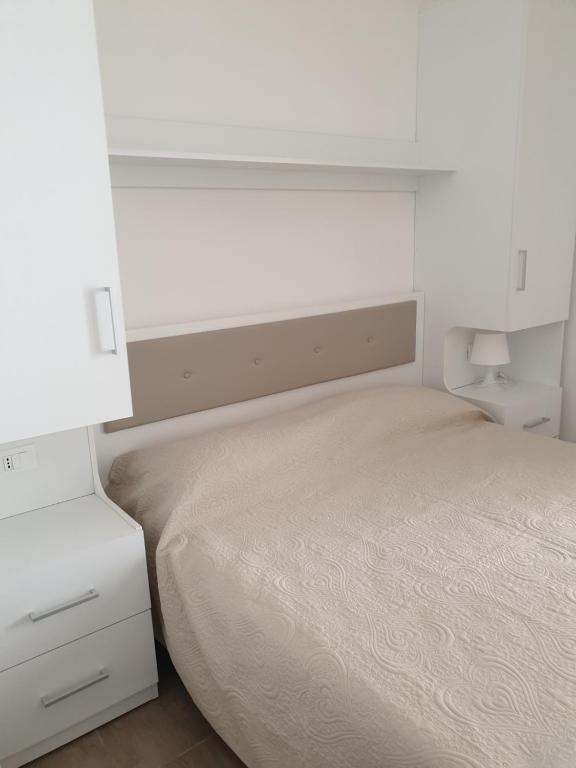 Łóżko lub łóżka w pokoju w obiekcie Green Park Residence