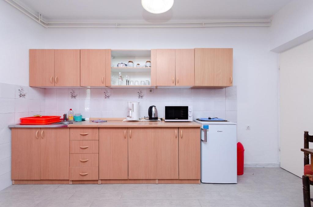 Kuchyň nebo kuchyňský kout v ubytování Apartments VESNA