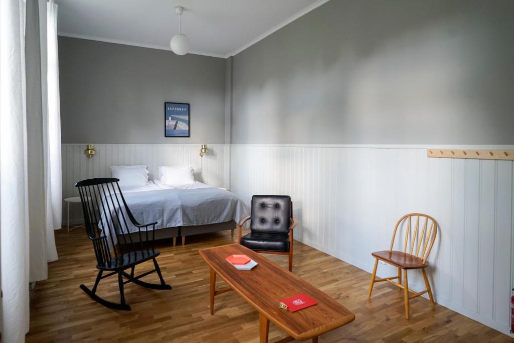 Postel nebo postele na pokoji v ubytování Nordic Refuge B&B