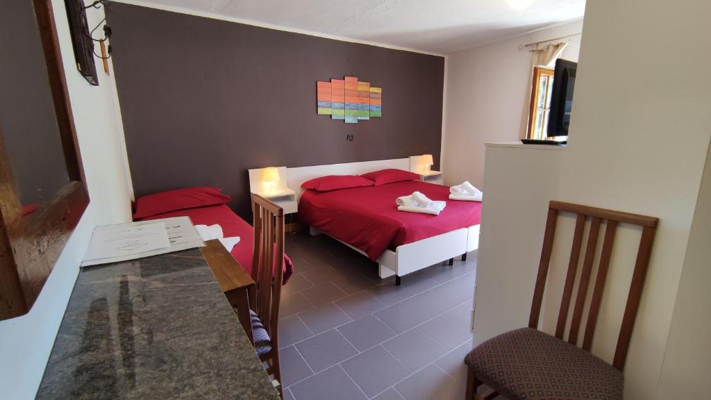 Postel nebo postele na pokoji v ubytování Hotel Edelweiss