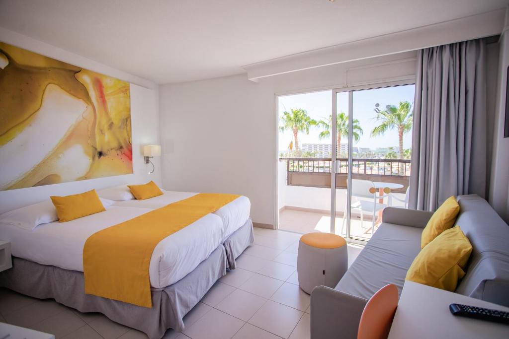 Posteľ alebo postele v izbe v ubytovaní Servatur Waikiki