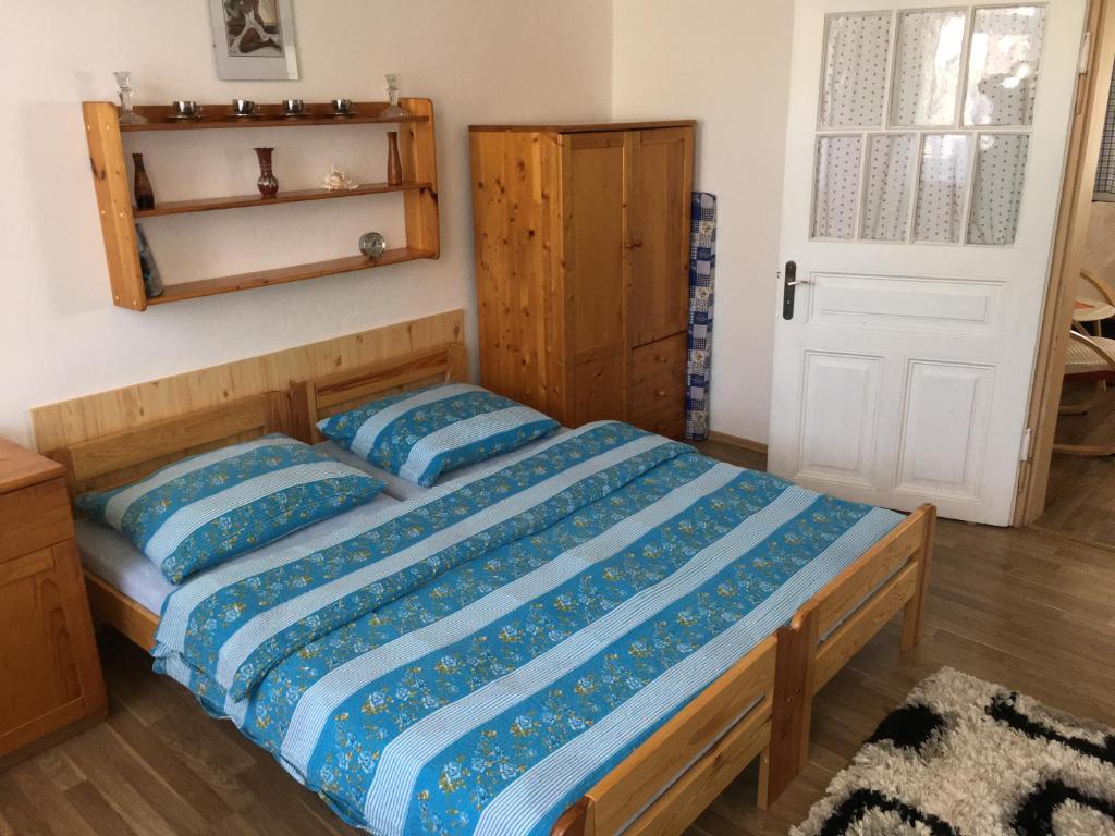 Postel nebo postele na pokoji v ubytování Chalupa a apartmány Morajda