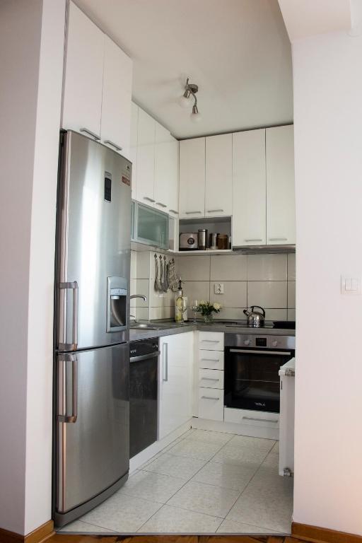 Kuchyň nebo kuchyňský kout v ubytování Apartman MIA Centar