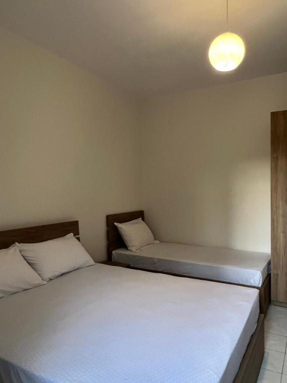 Postel nebo postele na pokoji v ubytování Guest House SALA