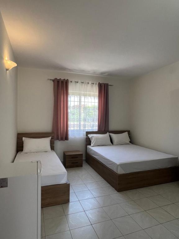 Postel nebo postele na pokoji v ubytování Guest House SALA
