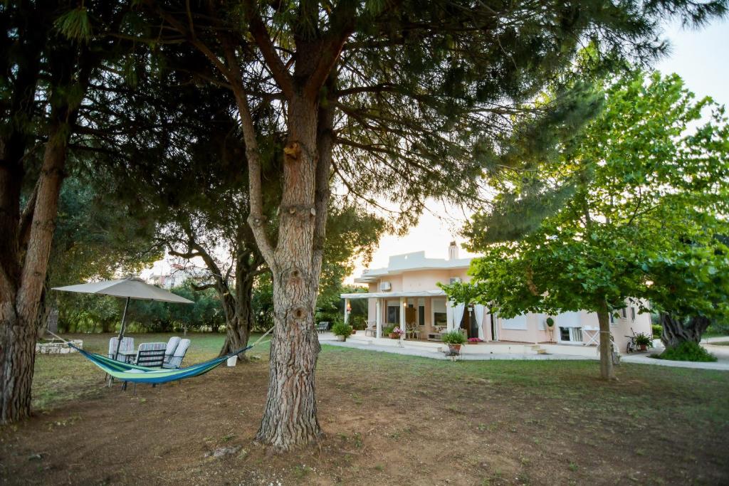 A garden outside Kiani Akti Villas