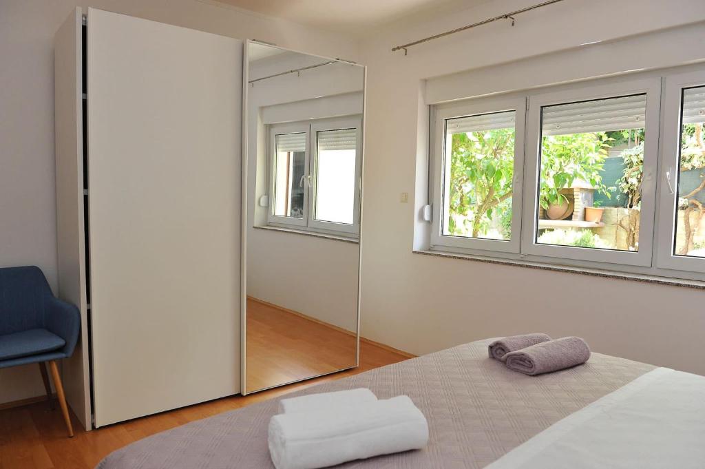 Posteľ alebo postele v izbe v ubytovaní Apartment Botanic