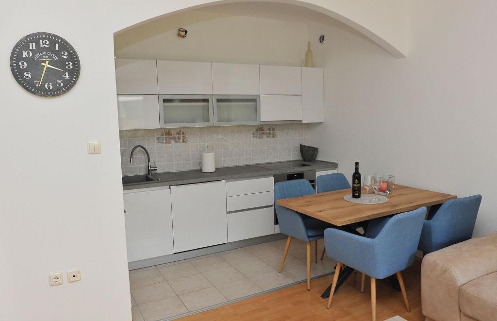 Kuchyňa alebo kuchynka v ubytovaní Apartment Botanic