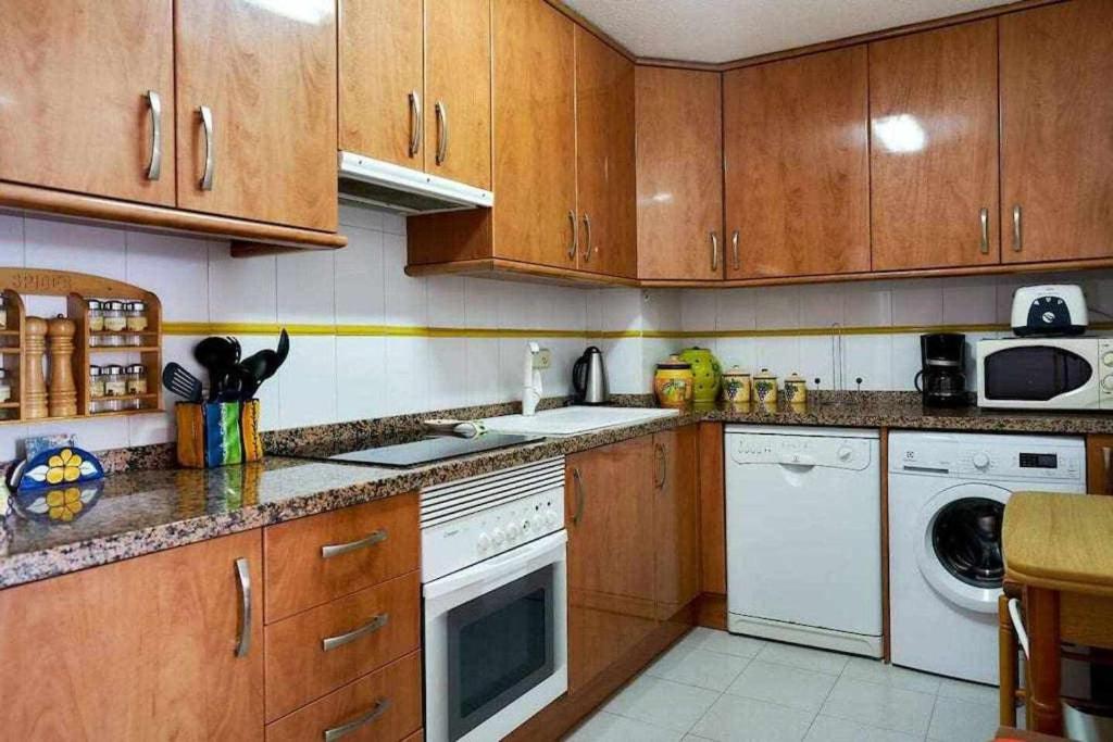 A kitchen or kitchenette at Espanhouse Olga apartment