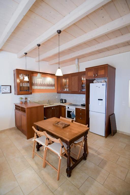 A kitchen or kitchenette at Kiani Akti Villas