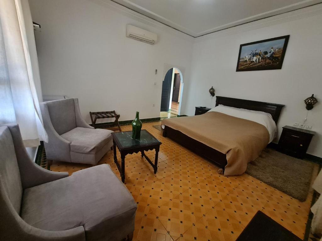 Postel nebo postele na pokoji v ubytování Targafit Hotel & Hammam