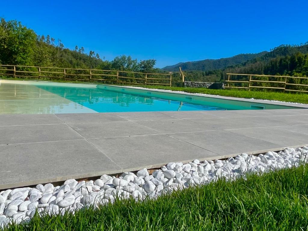 Bazén v ubytování Agriturismo Terre di Ginepro nebo v jeho okolí