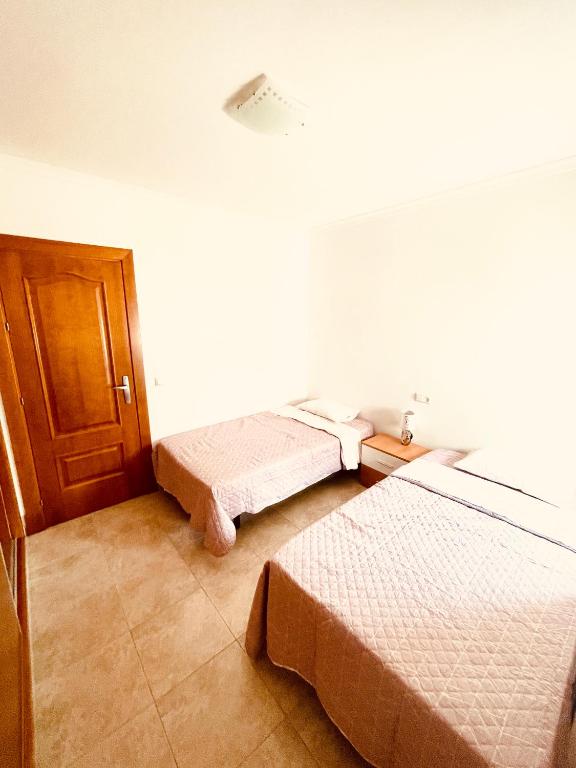 Posteľ alebo postele v izbe v ubytovaní Apartamento familiar 2 habitaciones - Terrazas-WiFi