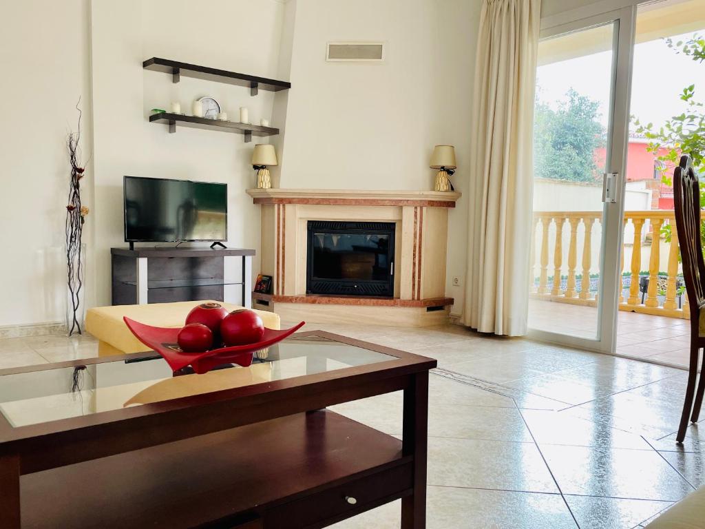 Televízia a/alebo spoločenská miestnosť v ubytovaní Apartamento familiar 2 habitaciones - Terrazas-WiFi