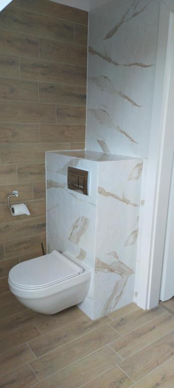 Koupelna v ubytování Apartamenty Heweliusz House